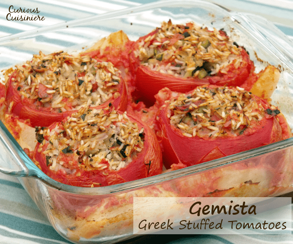 Greek Gemista brings big juicy tomatoes together with a healthy, vegetarian mixture of rice and summer produce, creating a perfect summer dish. | Curious Cuisiniere