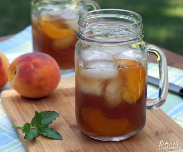 This lightly sweet Vietnamese Peach Tea is made with real peaches for a perfectly refreshing summer drink! | www.CuriousCuisiniere.com
