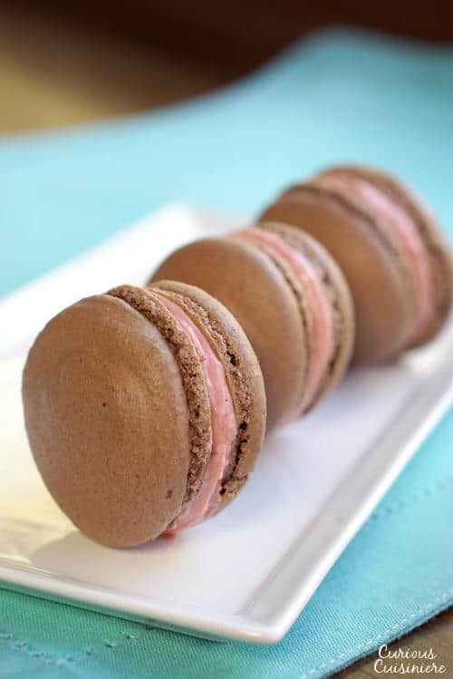 Chocolate French Macarons with Raspberry Filling • Curious Cuisiniere