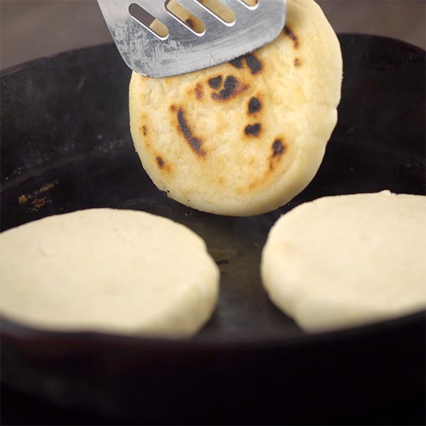 grill or frying pan for roasting arepas or tortillas, top view
