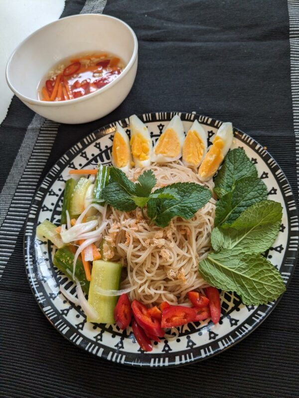 Mee Kola - Cambodian vegetarian noodles with rice noodles and pickled vegetables